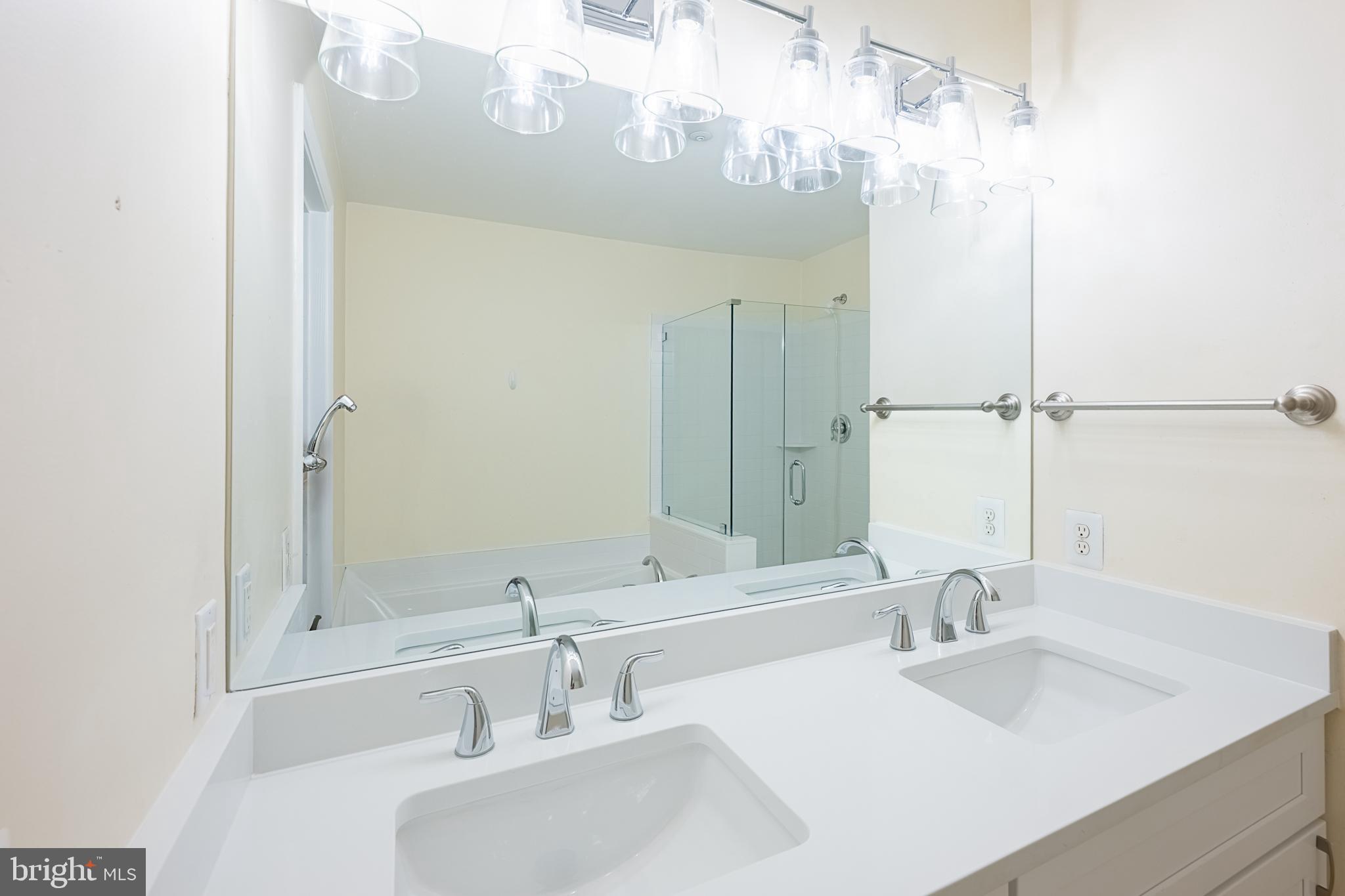 5920 Terrapin Place Alexandria, VA 22310 - Photo 50 of 67 a bathroom with a sink and a mirror