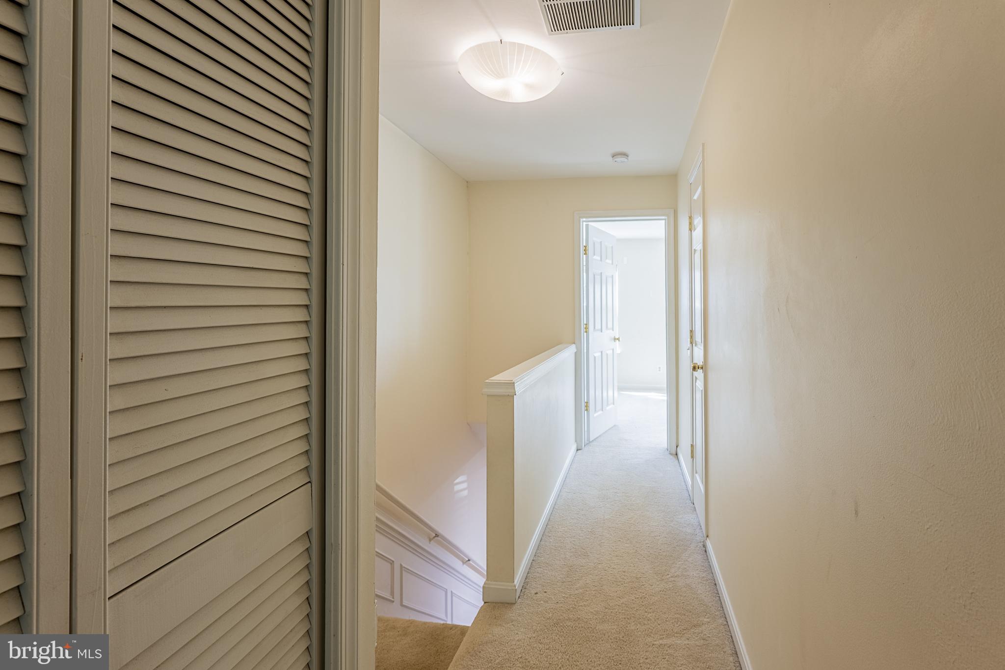 5920 Terrapin Place Alexandria, VA 22310 - Photo 52 of 67 a view of a bathroom from a hallway