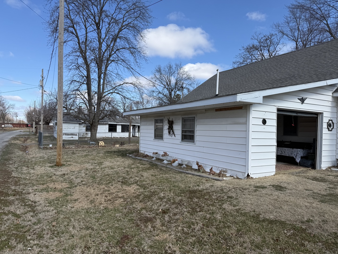 1421 West Maple Street Herrin, IL 62948 - Photo 2 of 15 a front view of a house with a yard
