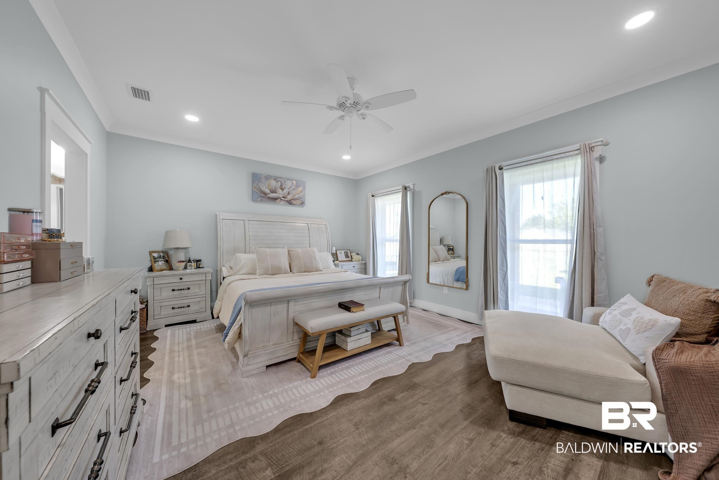 6576 Ranch Loop Road East Grand Bay, AL 36541 - Photo 18 of 39 Spacious bedroom featuring wood-finish flooring, light blue wall tones, white trim, recessed lighting, and a ceiling fan