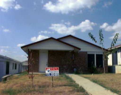 5720 Signal Point Austin, TX 78724 - Photo 1 of 1 a front view of a house with garage