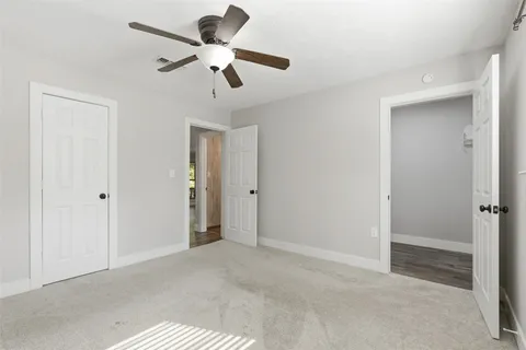 a view of a livingroom with a ceiling fan