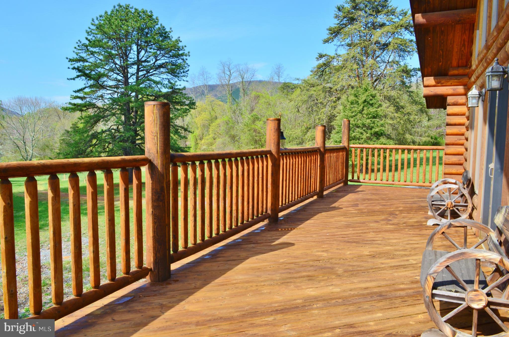 7877 Moreland Gap Road Fort Valley, VA 22652 - Photo 5 of 30 Huge Front Deck for Family-Sized Entertaining