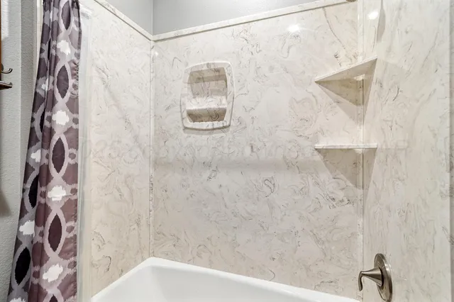 a view of a building with a patio