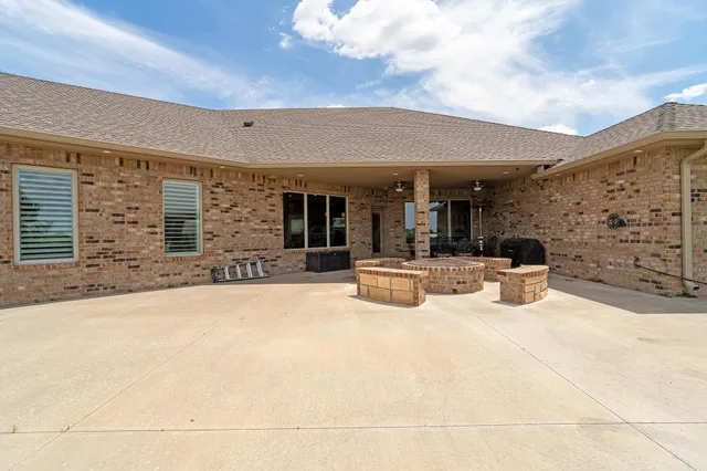 a bathroom with a sink vanity and a mirror