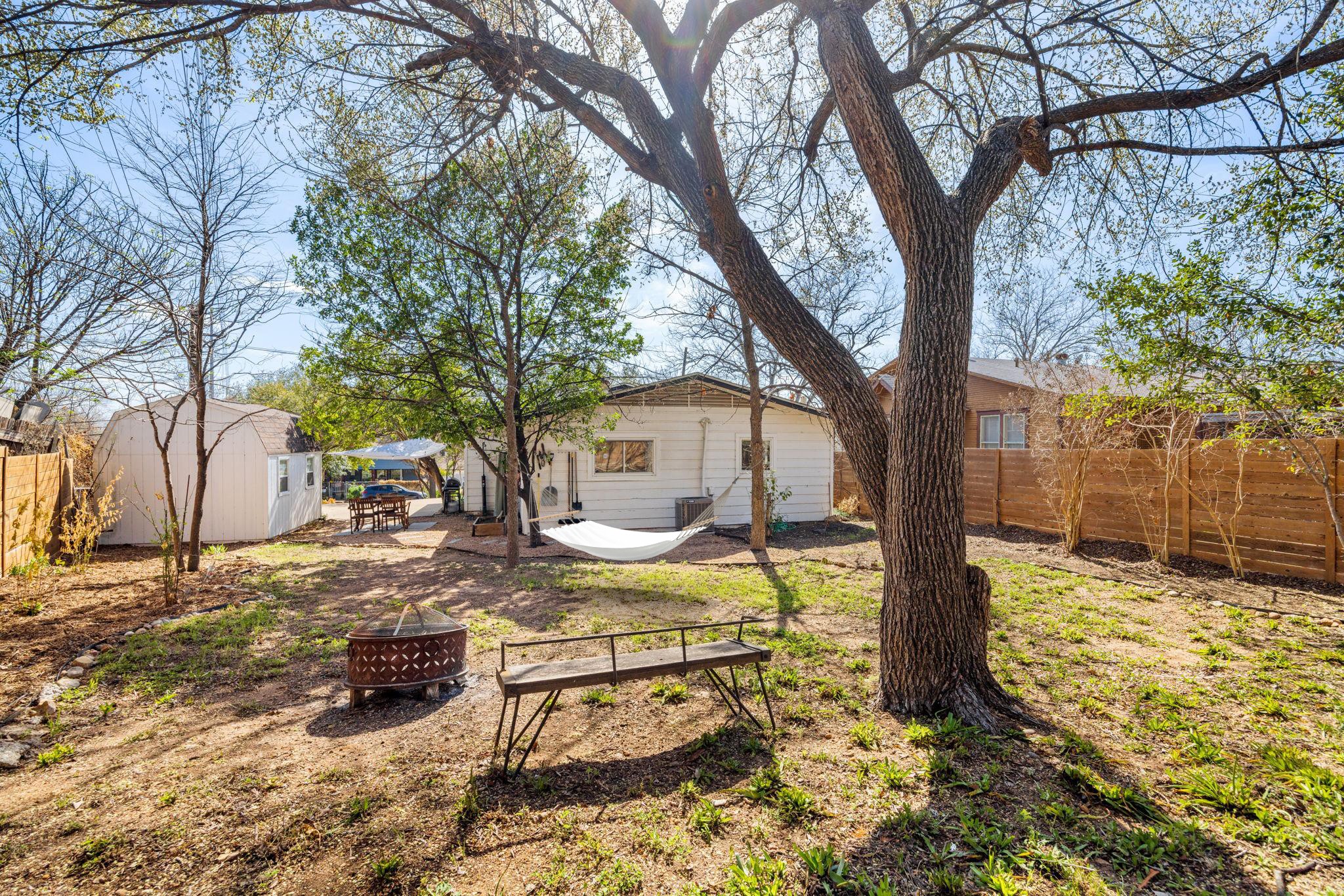 5002 Ledesma Road Austin, TX 78721 - Photo 27 of 32 a view of a house with snow on the tree