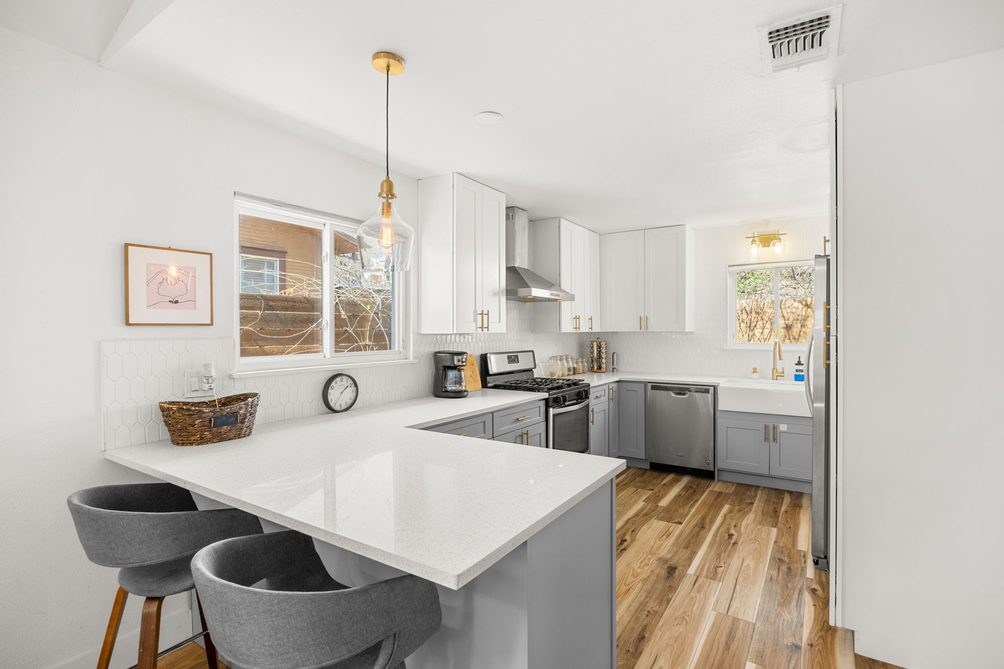 5002 Ledesma Road Austin, TX 78721 - Photo 10 of 32 a kitchen with furniture a window and chairs