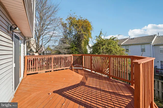a view of balcony with wooden floor