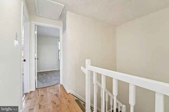 a kitchen with a sink cabinets and window