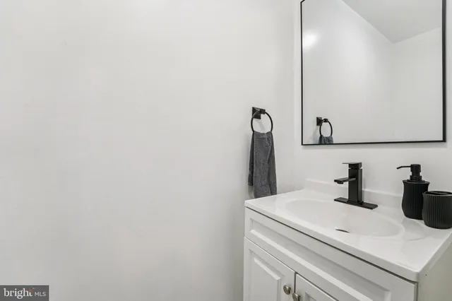 a view of an empty room and a window