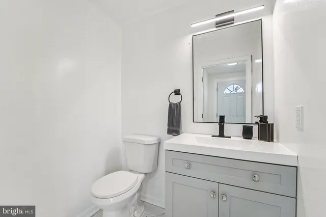 a view of living room with furniture and window
