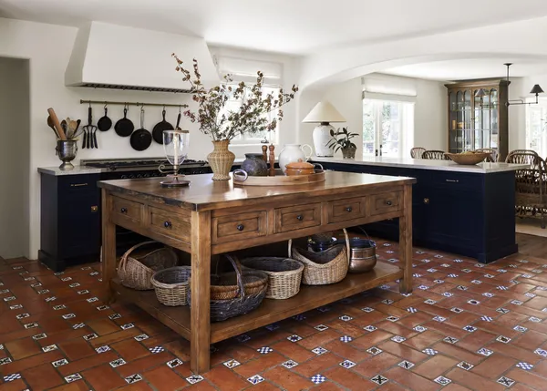 a view of a kitchen with granite countertop a sink and a stove