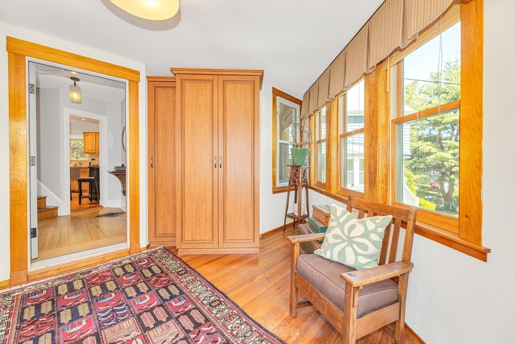 112 Perham Street Boston, MA 02132 - Photo 5 of 36 a bedroom with furniture and a window