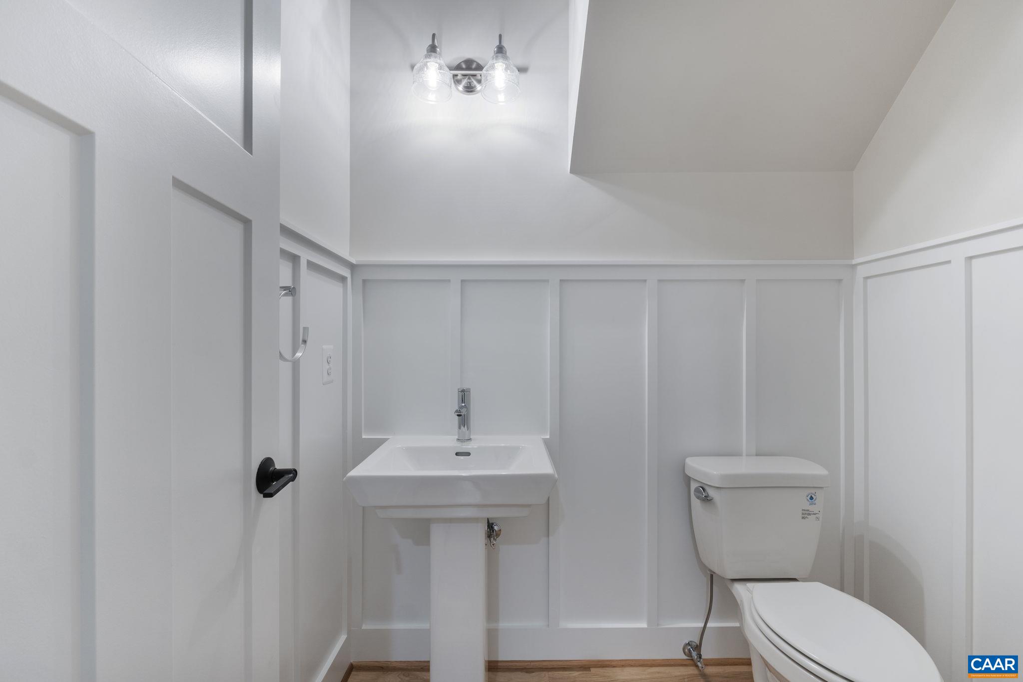 3 Lonicera Way Charlottesville, VA 22911 - Photo 12 of 31 a bathroom with a toilet a sink and mirror