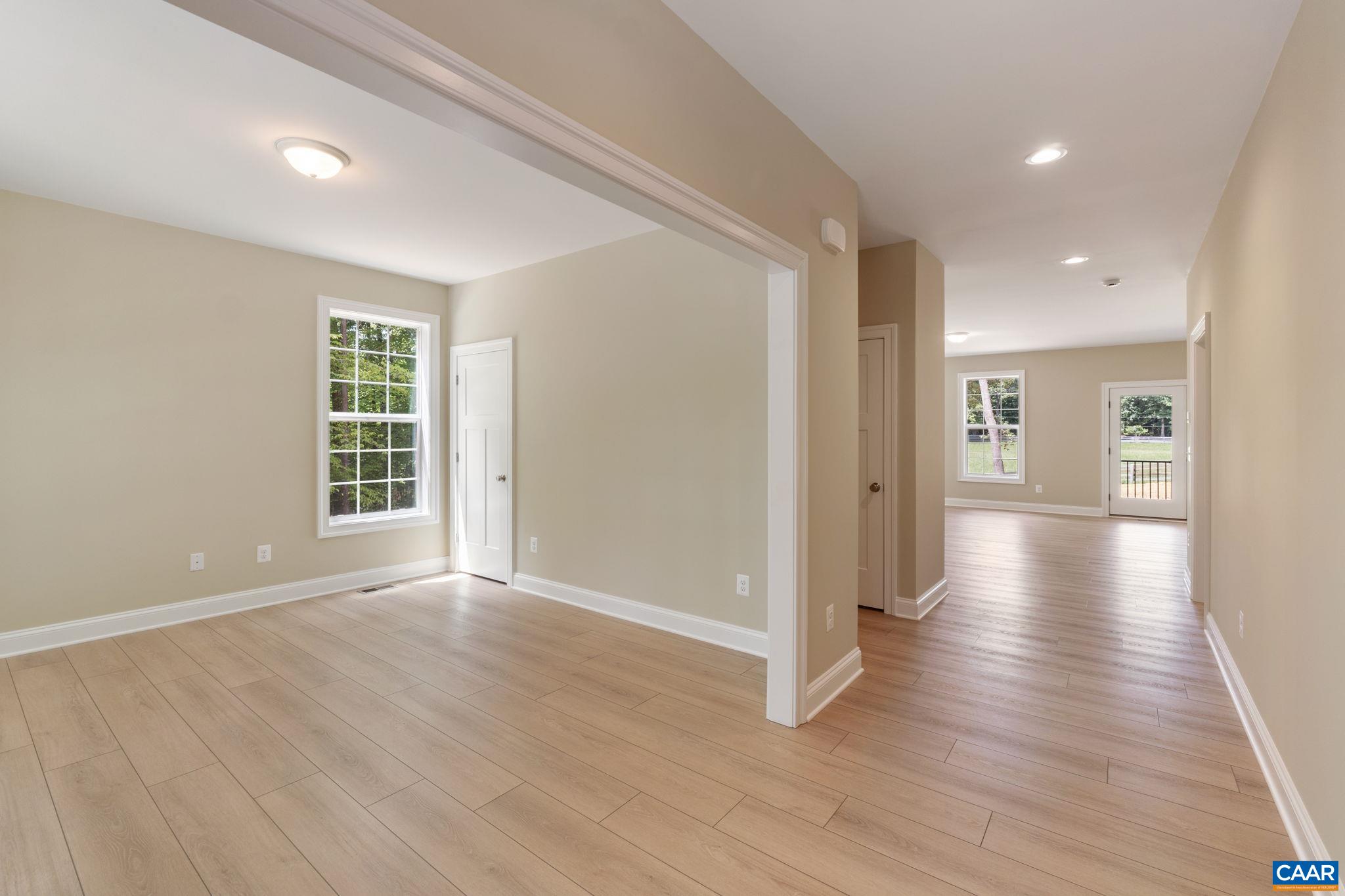 3 Lonicera Way Charlottesville, VA 22911 - Photo 15 of 31 wooden floor in an empty room with a window