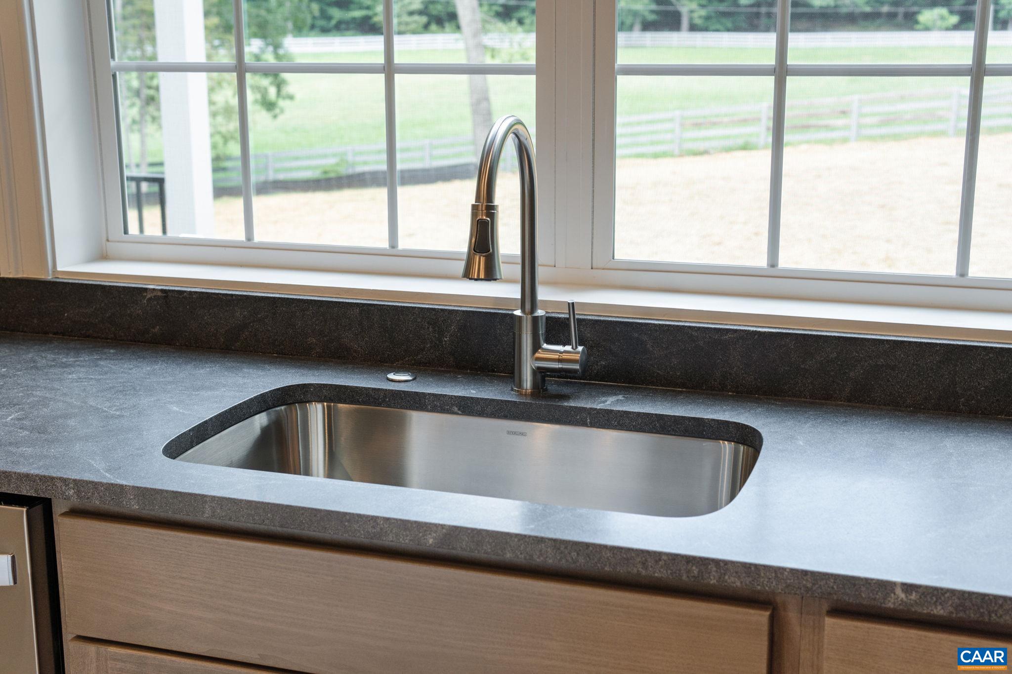 3 Lonicera Way Charlottesville, VA 22911 - Photo 6 of 31 a close view of a sink and faucet