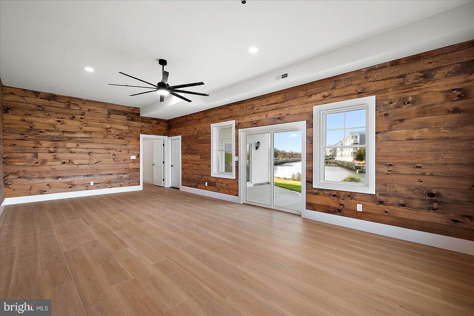 12971 Inlet Isle Lane Ocean City, MD 21842 - Photo 78 of 134 Game Room on the lower level with ceiling fan