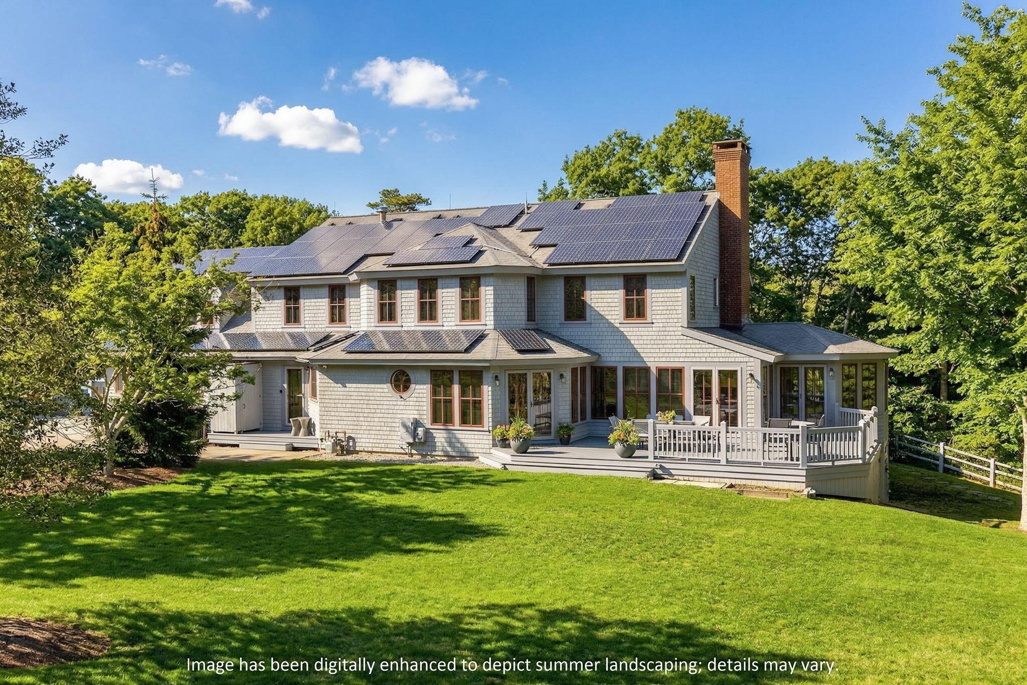 35 Northgate Road North Chatham, MA 02650 - Photo 1 of 75 a front view of a house with a garden and trees