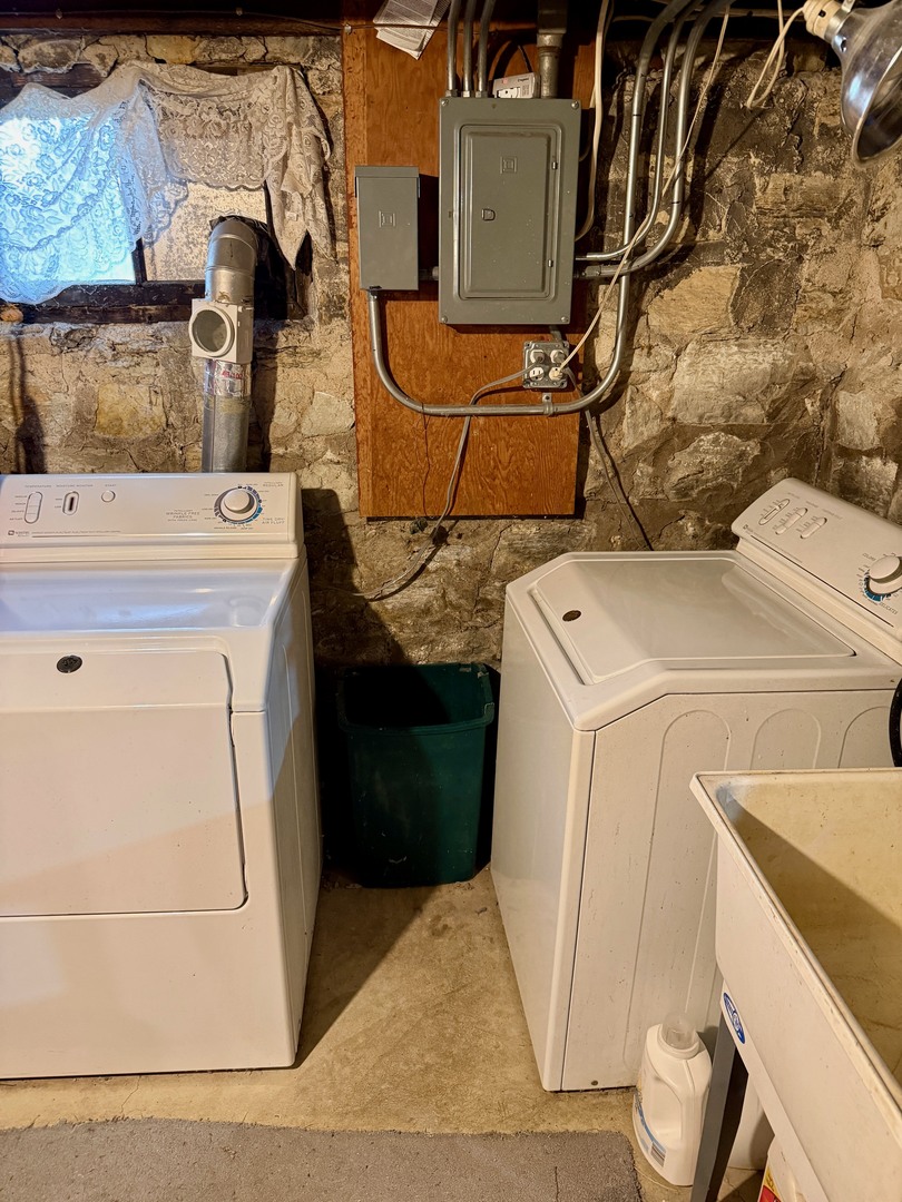 742 South 4th Street DeKalb, IL 60115 - Photo 31 of 46 a utility room with dryer and washer