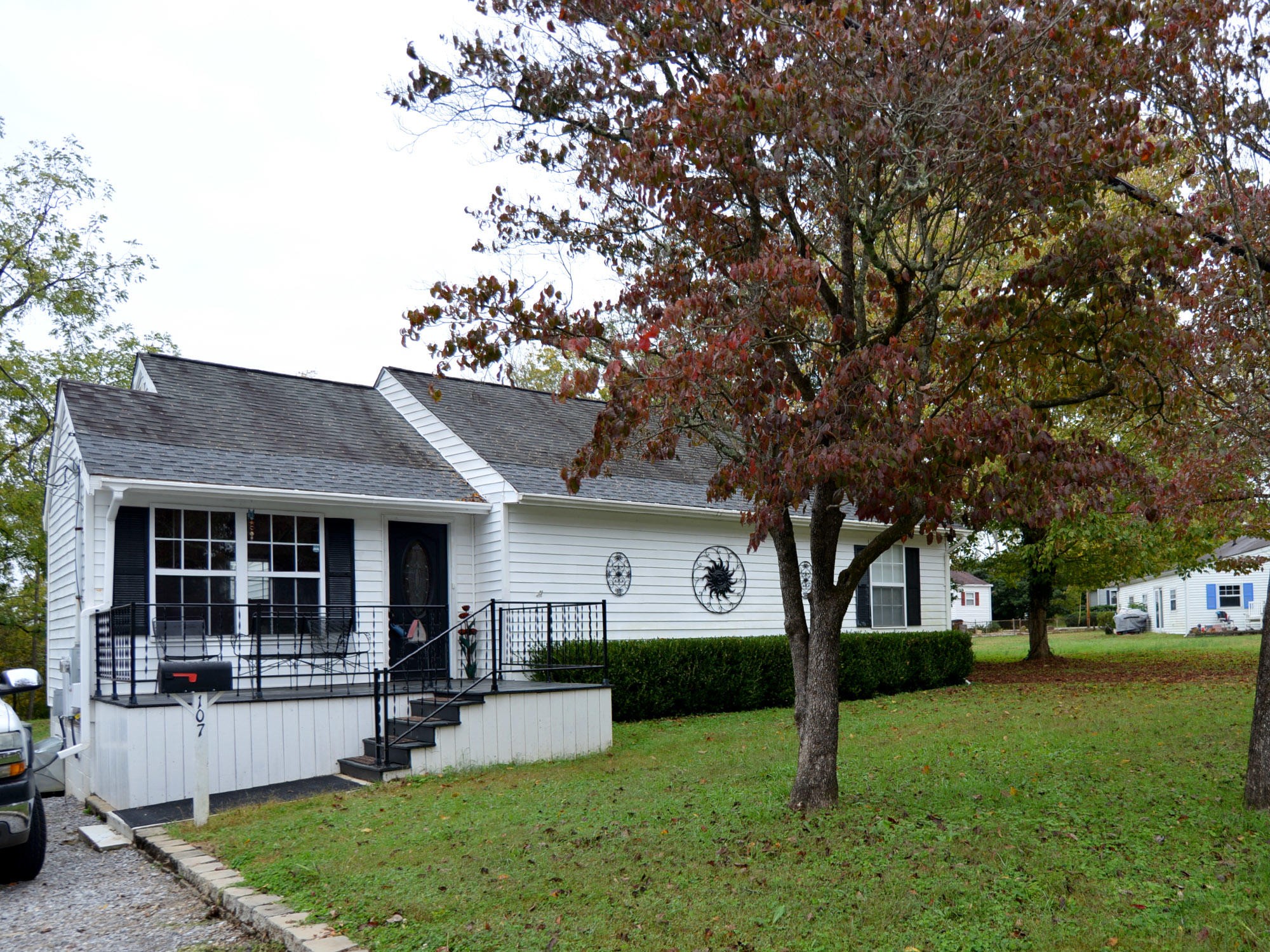 107 Salem Road Oak Ridge, TN 37830 - Photo 1 of 25 a front view of a house with a yard and trees