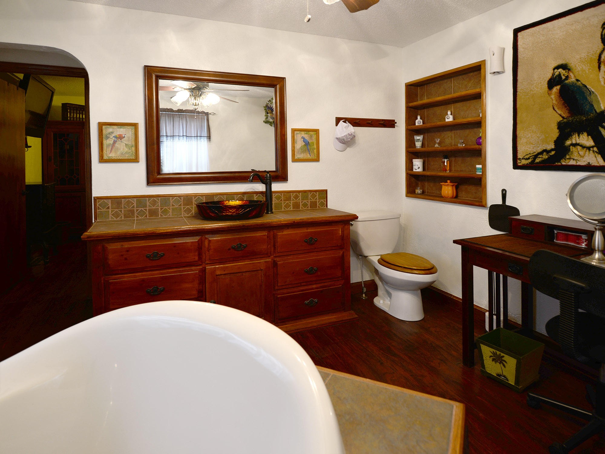 107 Salem Road Oak Ridge, TN 37830 - Photo 19 of 25 a bathroom with a sink a toilet and a mirror