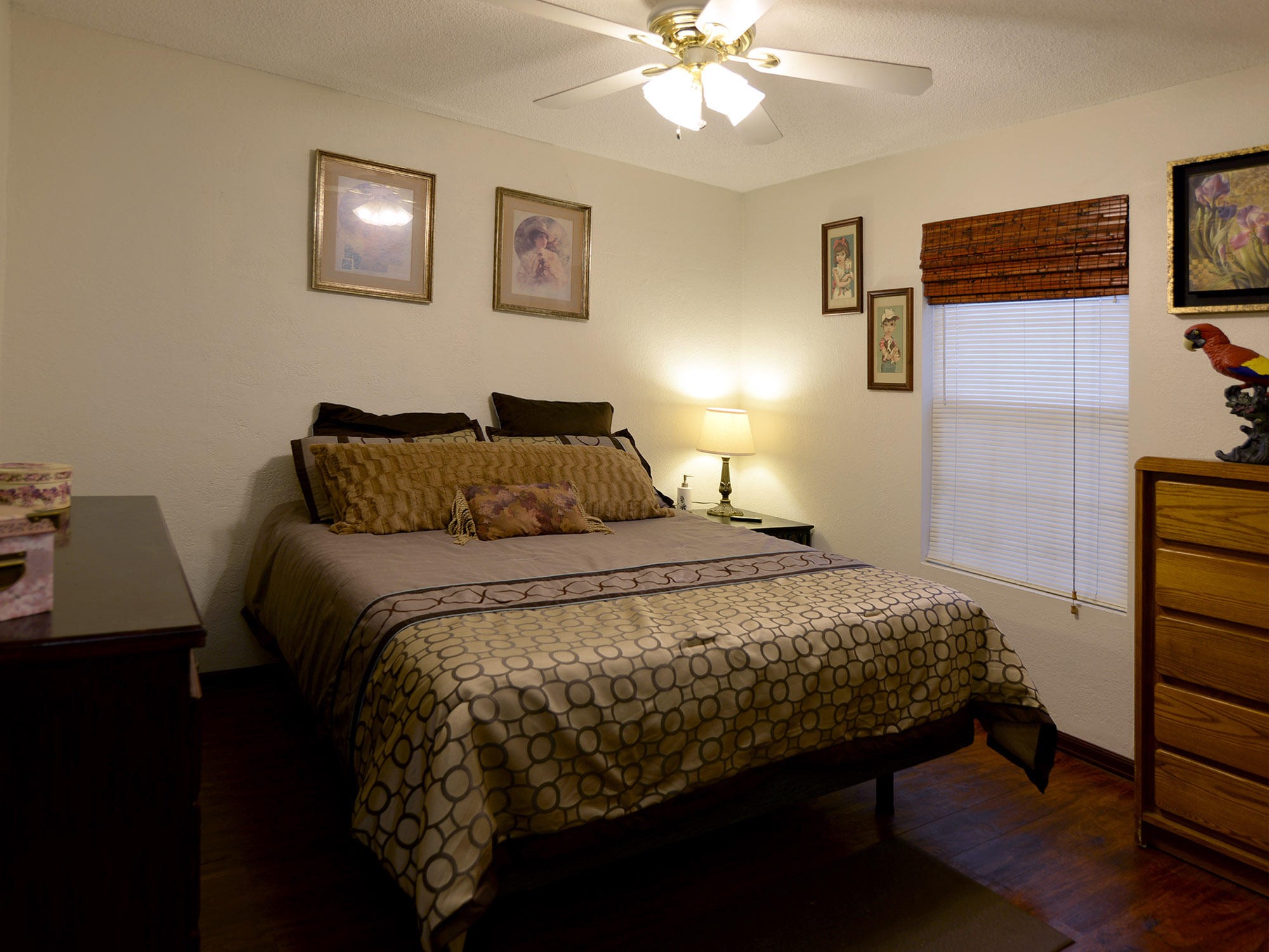 107 Salem Road Oak Ridge, TN 37830 - Photo 20 of 25 a bedroom with a bed and a chandelier