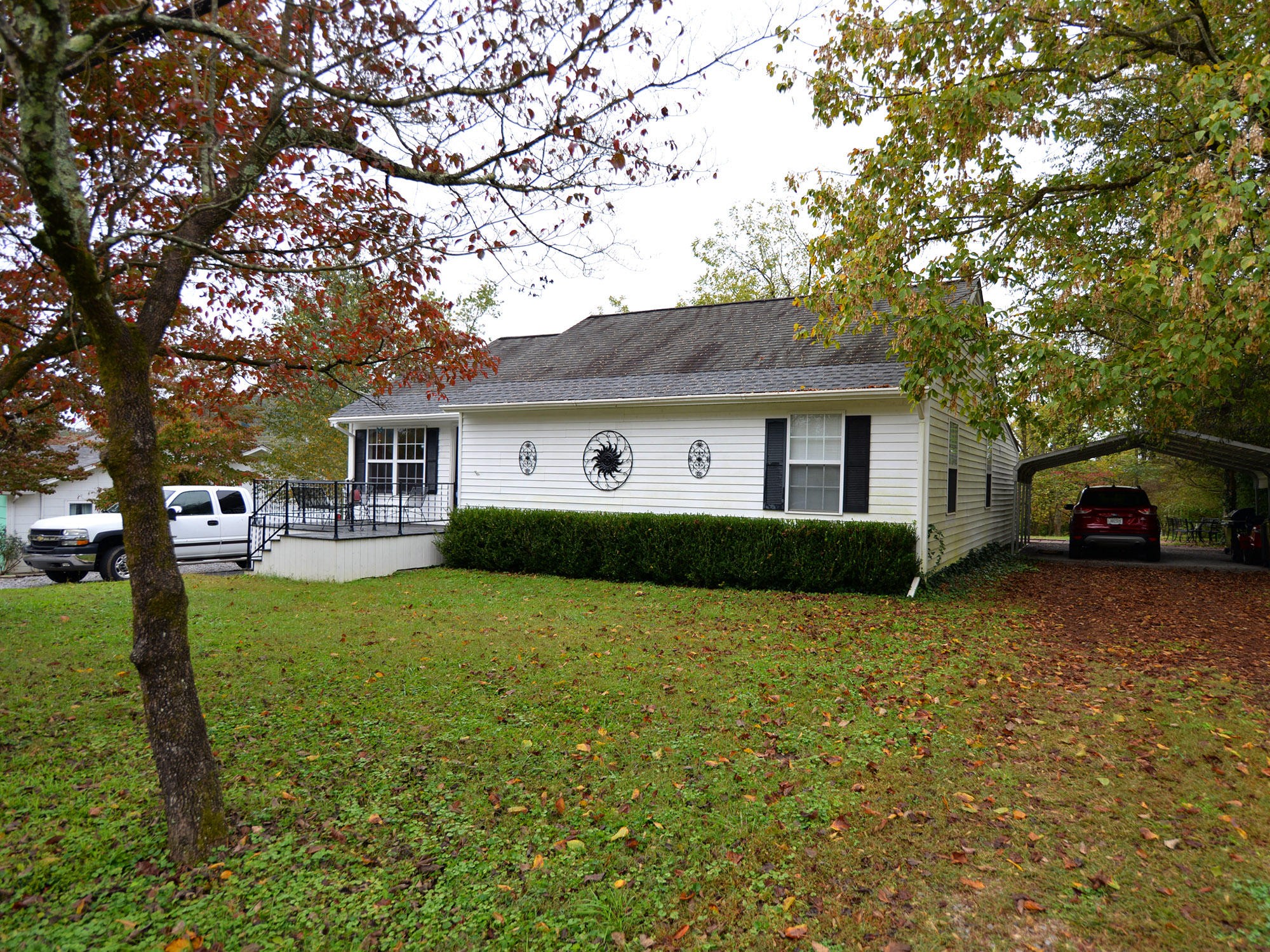 107 Salem Road Oak Ridge, TN 37830 - Photo 2 of 25 a front view of a house with a garden