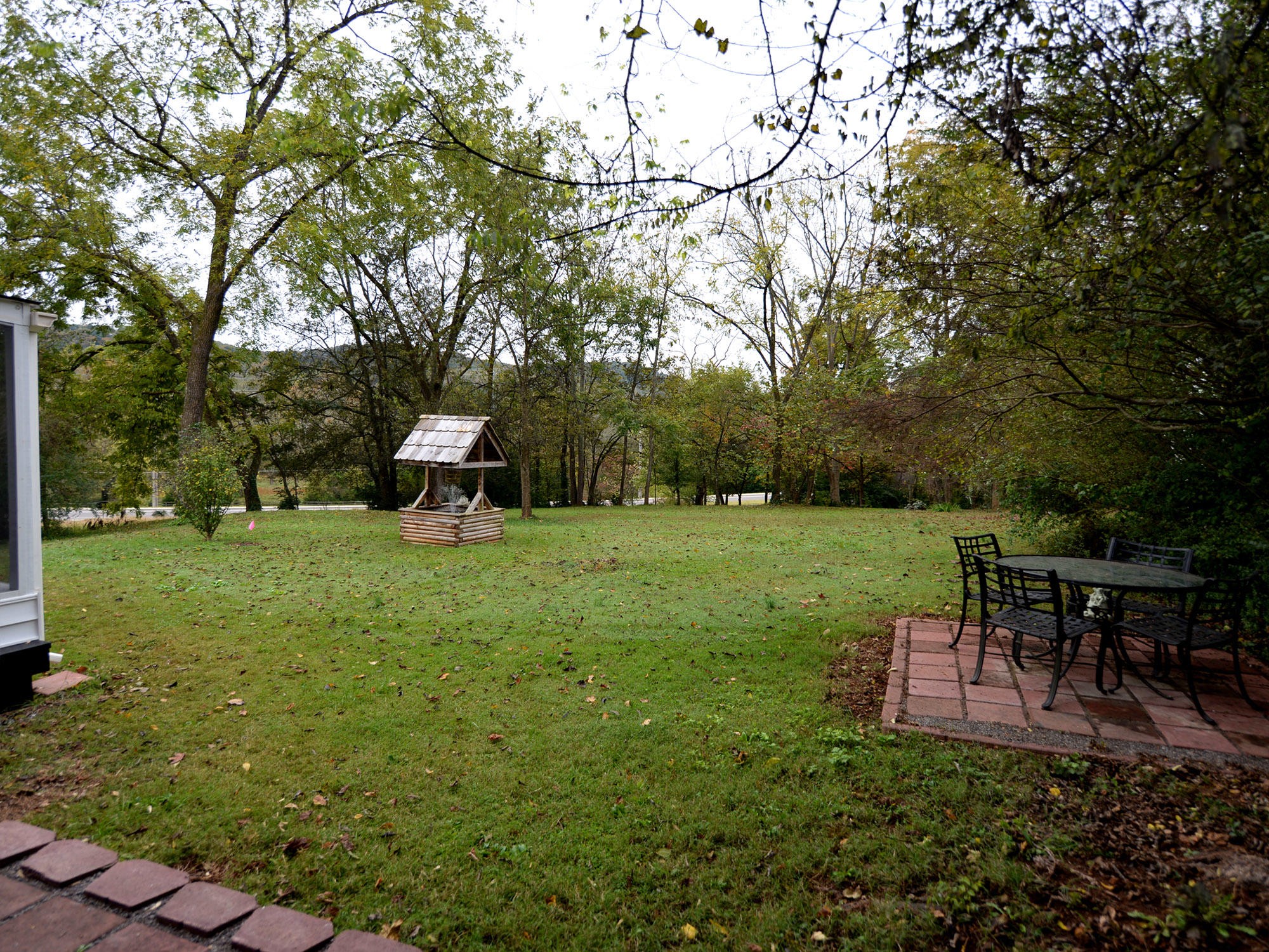 107 Salem Road Oak Ridge, TN 37830 - Photo 23 of 25 a view of a garden with plants and trees
