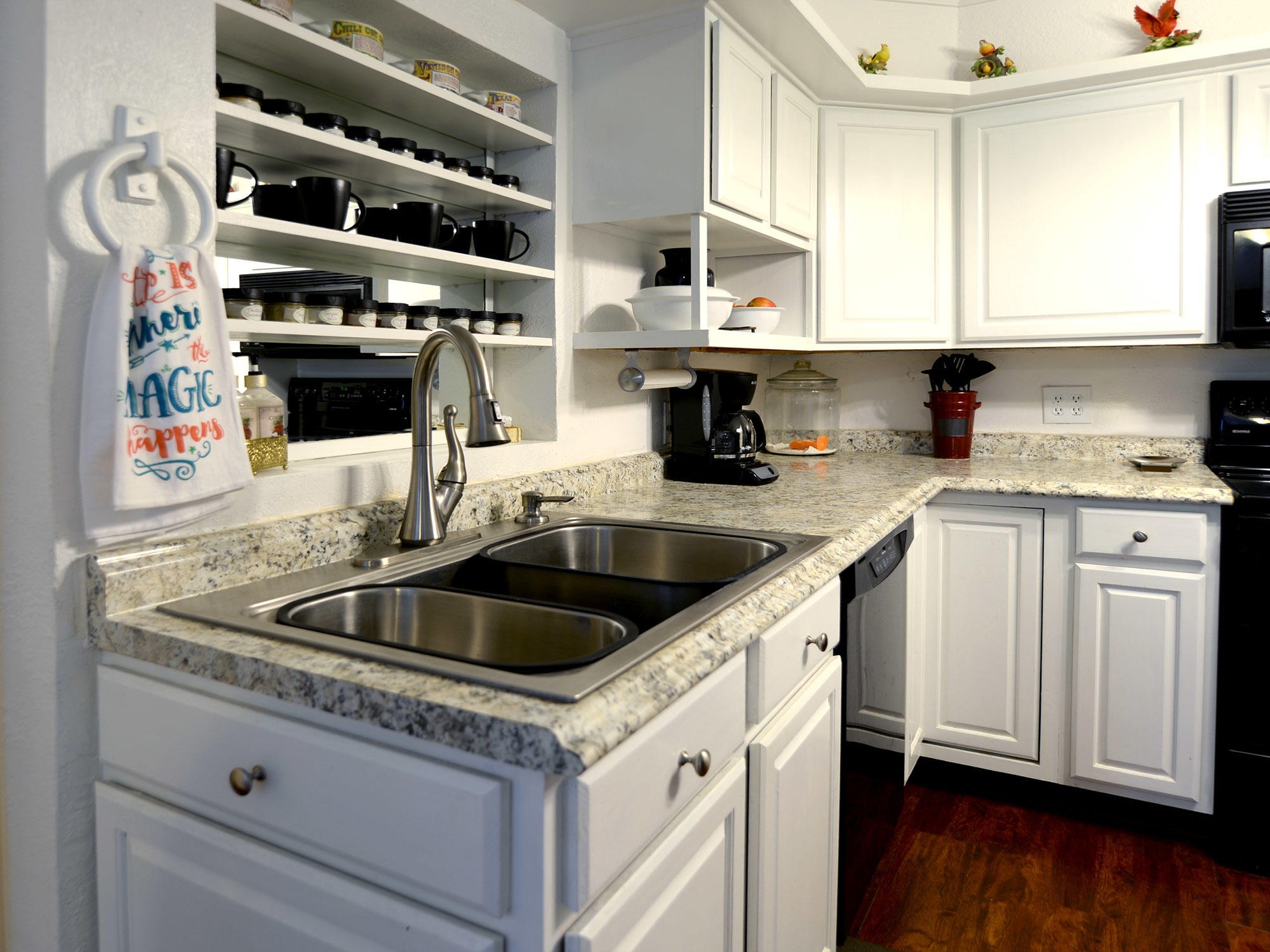 107 Salem Road Oak Ridge, TN 37830 - Photo 10 of 25 a kitchen with cabinets and wooden floor
