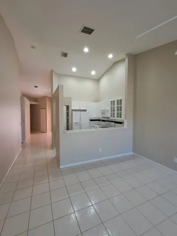 a view of workspace with kitchen