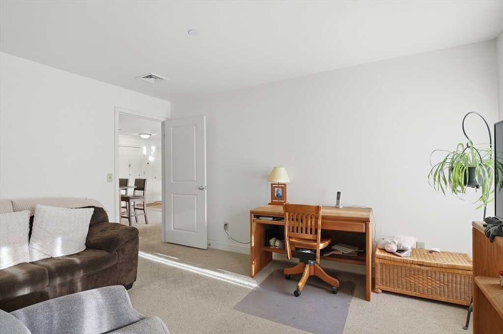 1818 Main Street, Unit 204 Holden, MA 01522 - Photo 17 of 30 a workspace with furniture and window