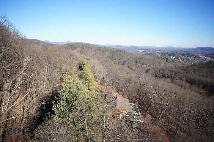 3220 Fordham Road Southwest Roanoke, VA 24014 - Photo 2 of 33 a view of a large mountain range with trees in the background