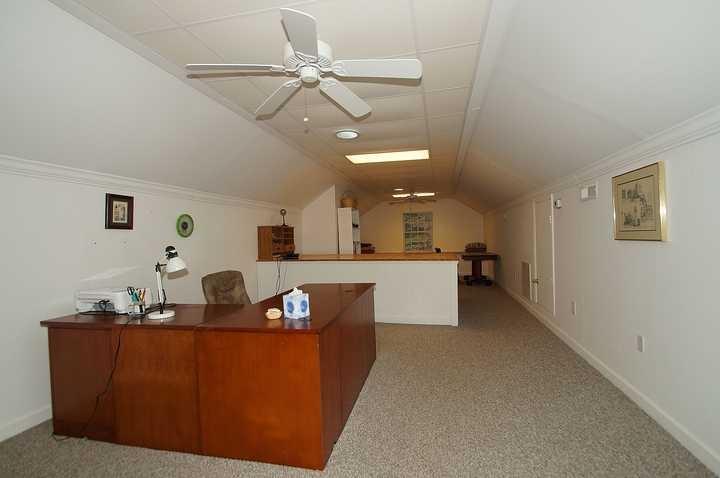 3220 Fordham Road Southwest Roanoke, VA 24014 - Photo 25 of 33 a living room with furniture and a chandelier