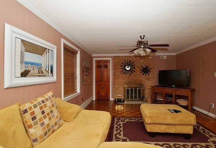 3220 Fordham Road Southwest Roanoke, VA 24014 - Photo 27 of 33 a bedroom with furniture and a flat screen tv