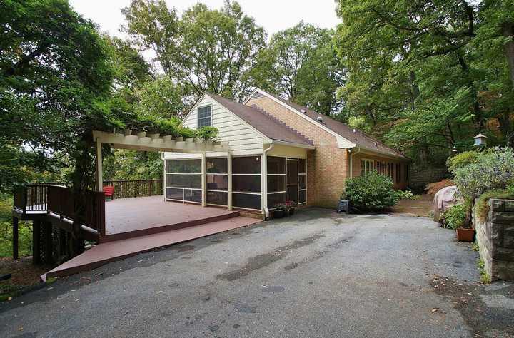 3220 Fordham Road Southwest Roanoke, VA 24014 - Photo 33 of 33 a view of a house with backyard and sitting area