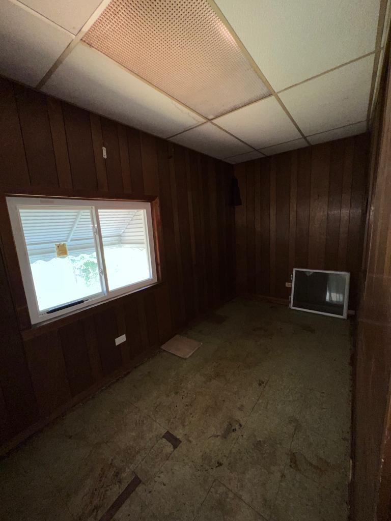 7348 South Sangamon Street Chicago, IL 60621 - Photo 11 of 29 a view of an empty room with a window