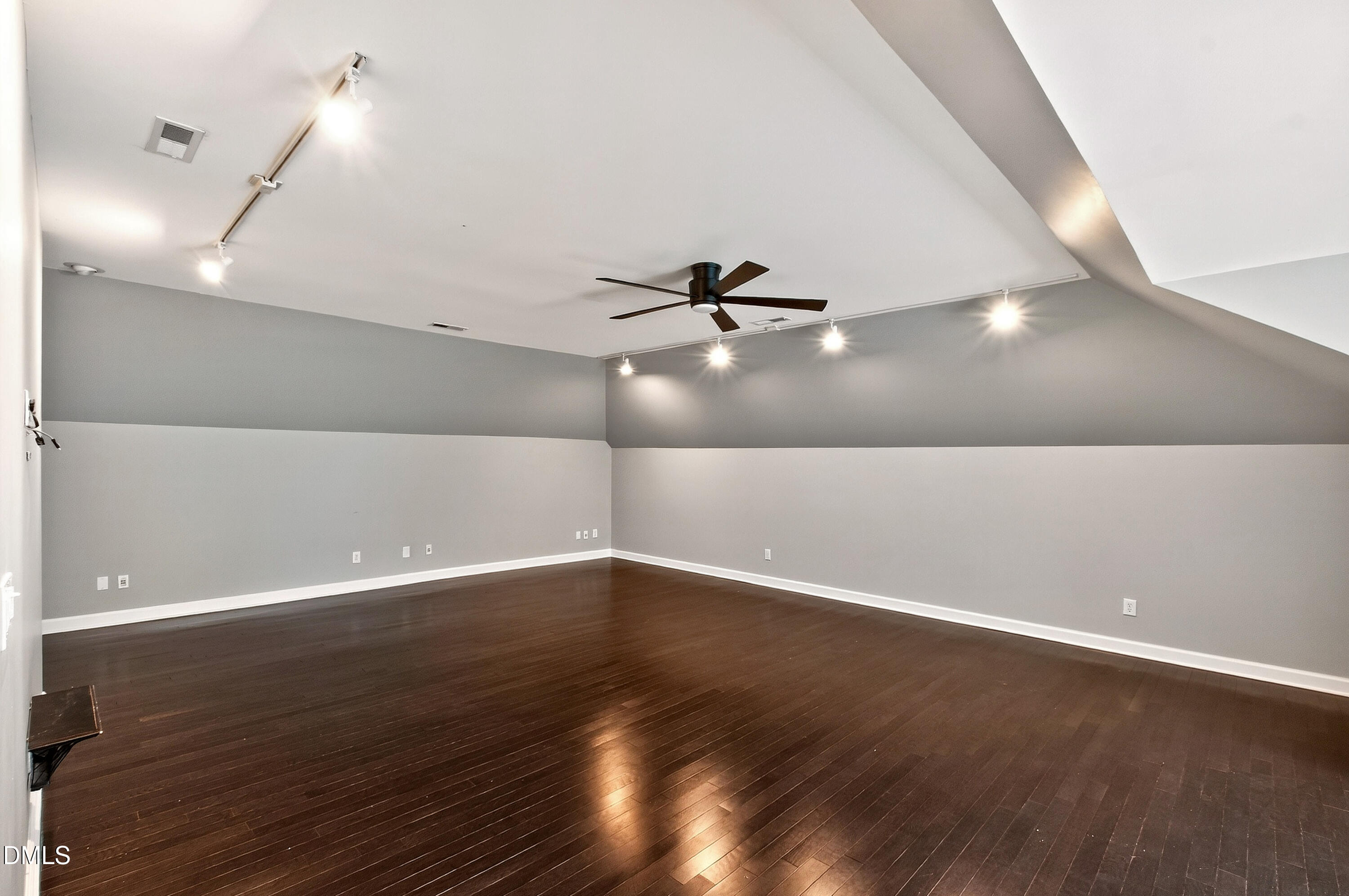 12408 Cilcain Court Raleigh, NC 27614 - Photo 57 of 80 an empty room with wooden floor and windows