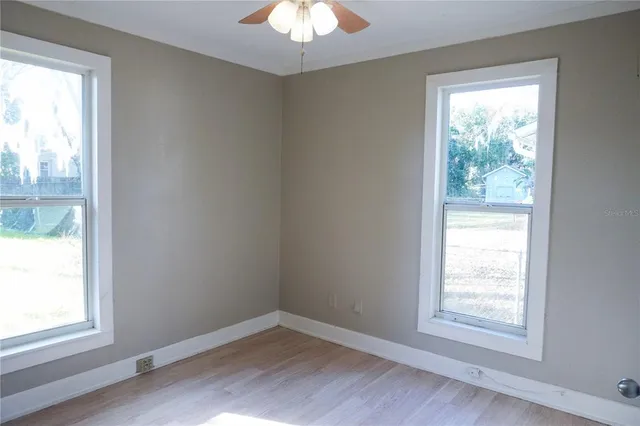 a view of an empty room and window