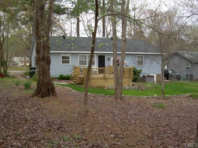 6012 Stratton Place Raleigh, NC 27609 - Photo 4 of 10 A view from the back corner of the large yard