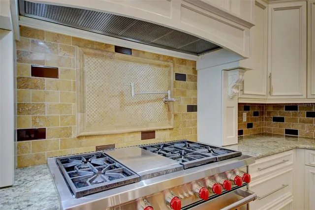 a view of a tree in the middle of a yard