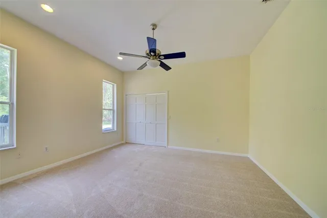a view of a hallway with a chandelier