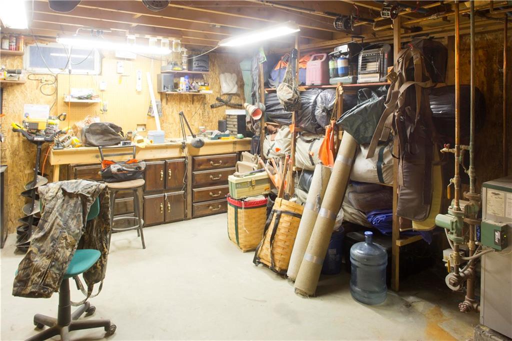 205 Church Road Bucksport, ME 04416 - Photo 20 of 28 Dry basement has built in work bench