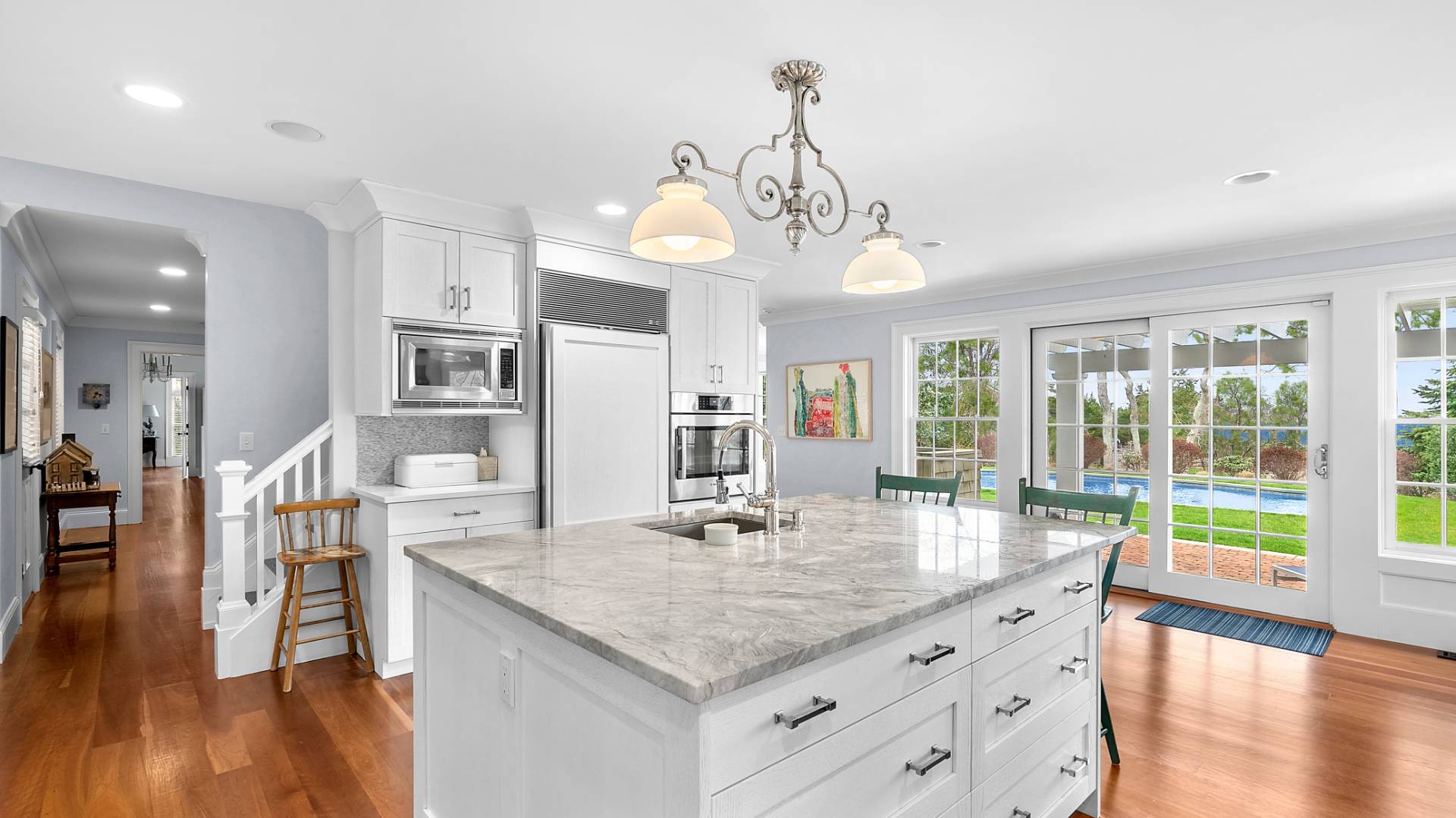 43 Thanet Way East Hampton, NY 11937 - Photo 14 of 34 a kitchen with stainless steel appliances granite countertop a kitchen island attached withe living room