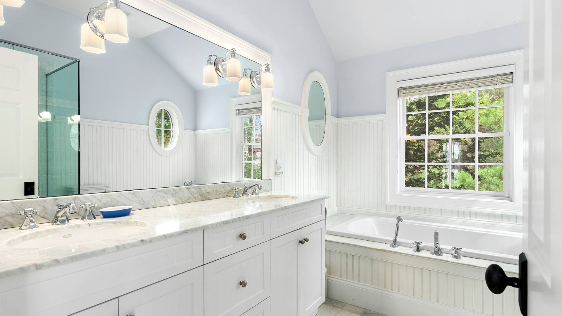 43 Thanet Way East Hampton, NY 11937 - Photo 20 of 34 a bathroom with a granite countertop sink and a large mirror
