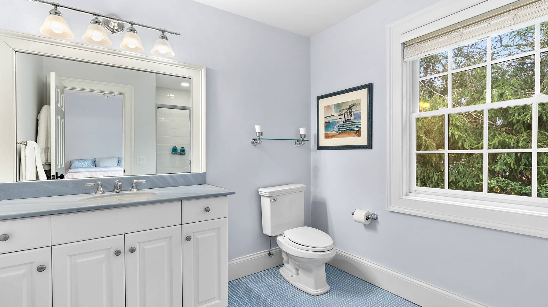 43 Thanet Way East Hampton, NY 11937 - Photo 22 of 34 a bathroom with a toilet a sink a window and mirror