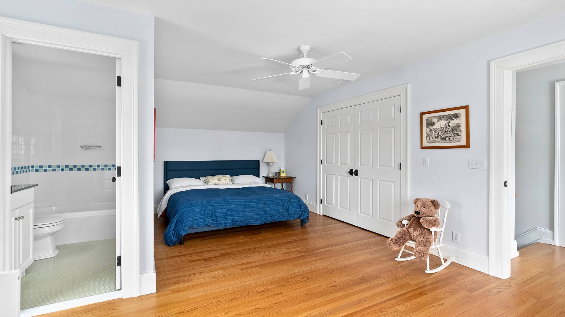 43 Thanet Way East Hampton, NY 11937 - Photo 23 of 34 a bedroom with a bed and a chandelier