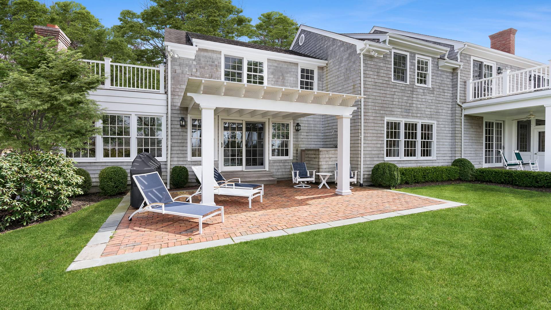 43 Thanet Way East Hampton, NY 11937 - Photo 31 of 34 a view of a house with backyard porch and sitting area