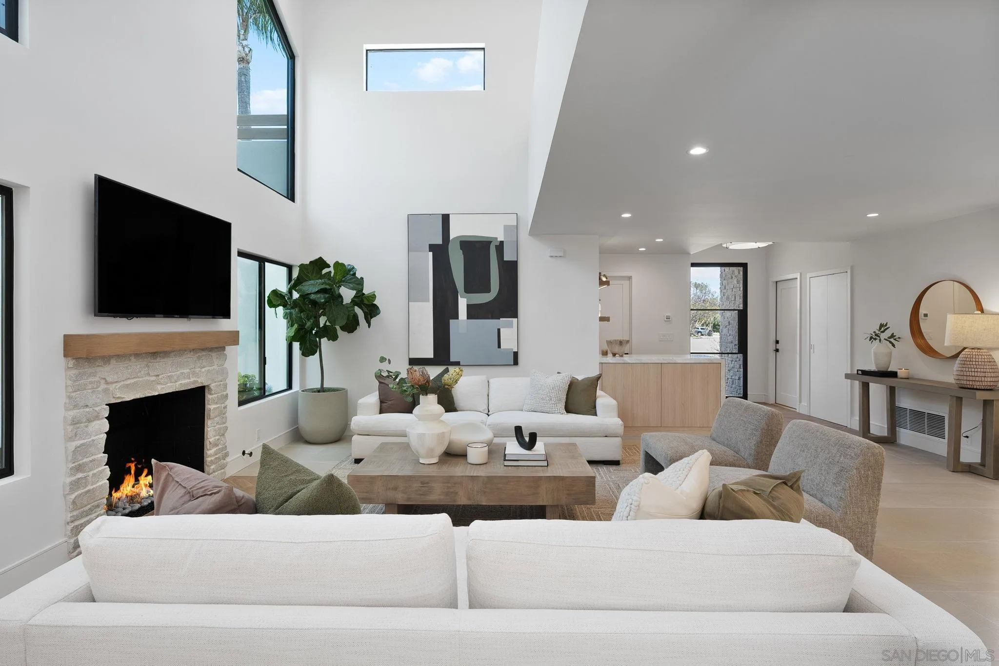 3835 Via Reposo Rancho Santa Fe, CA 92091 - Photo 16 of 34 a living room with furniture and a fireplace