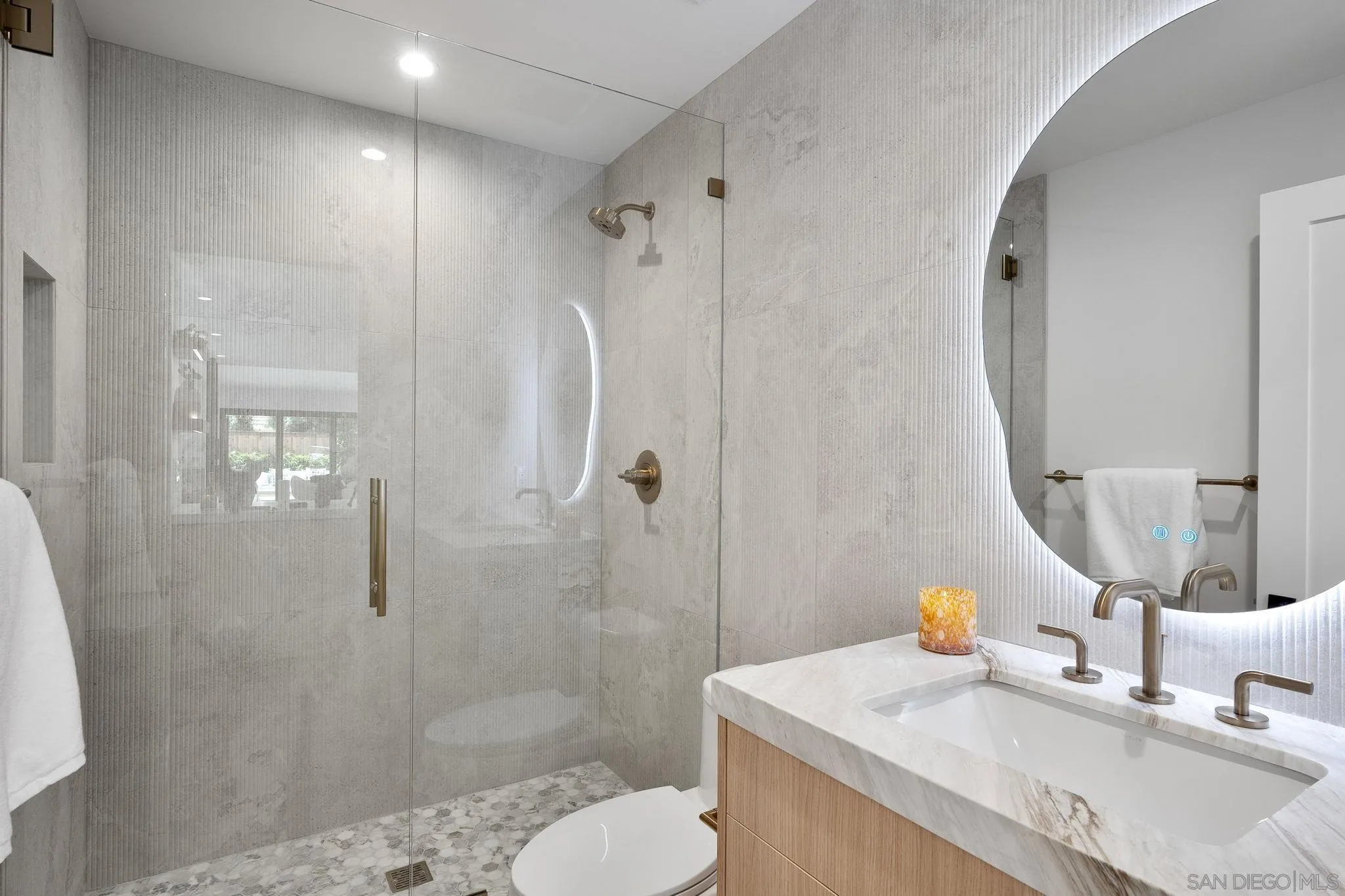 3835 Via Reposo Rancho Santa Fe, CA 92091 - Photo 23 of 34 a bathroom with a sink toilet and shower