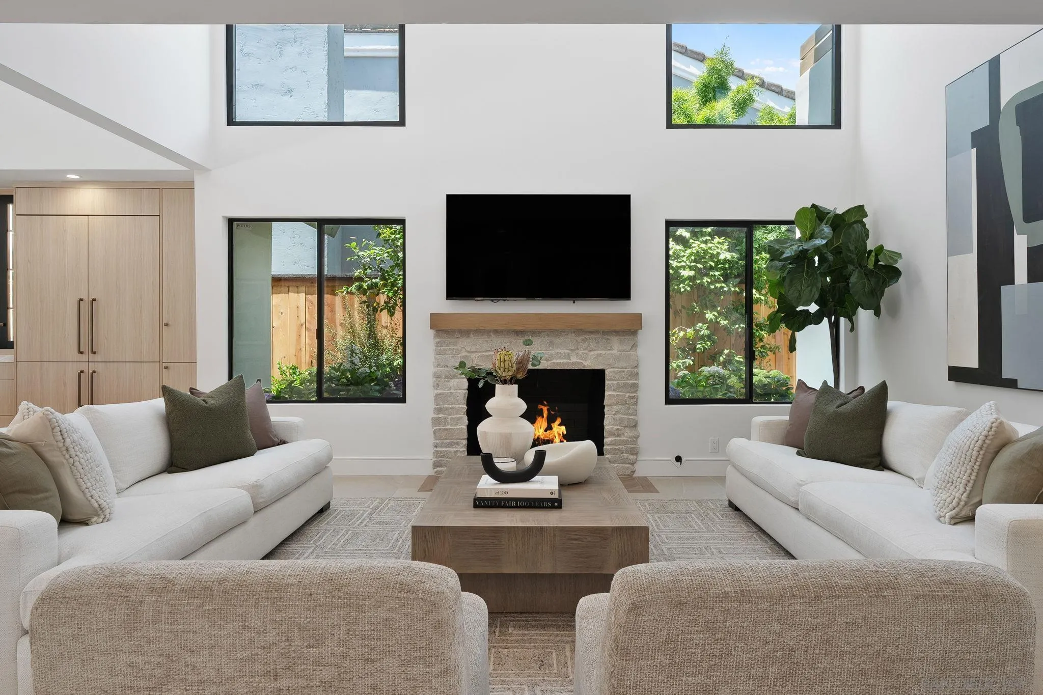3835 Via Reposo Rancho Santa Fe, CA 92091 - Photo 5 of 34 a living room with furniture a flat screen tv and a fireplace